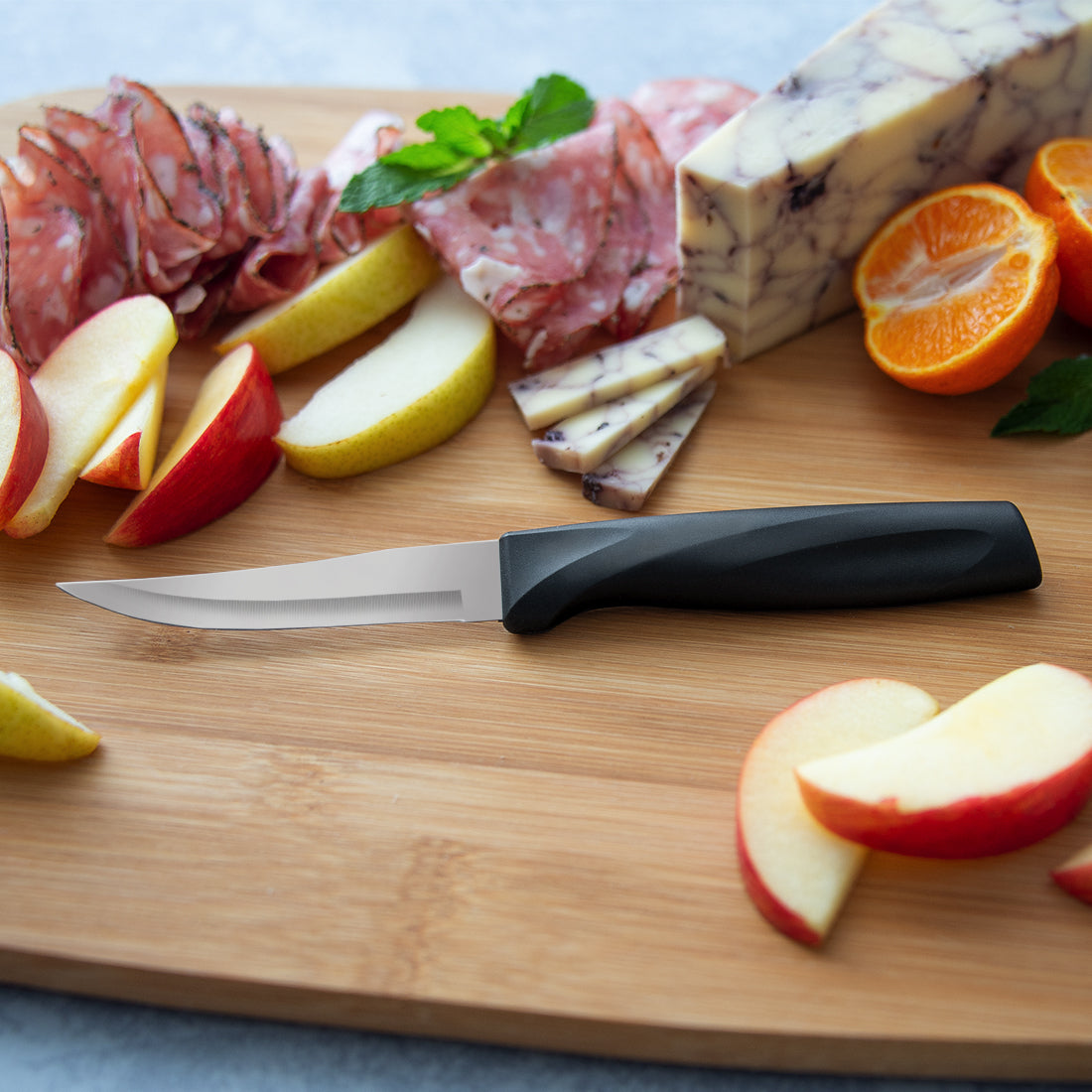 The Rada Anthem Wave handled heavy duty paring knife cutting and slicing fruit and meats. 