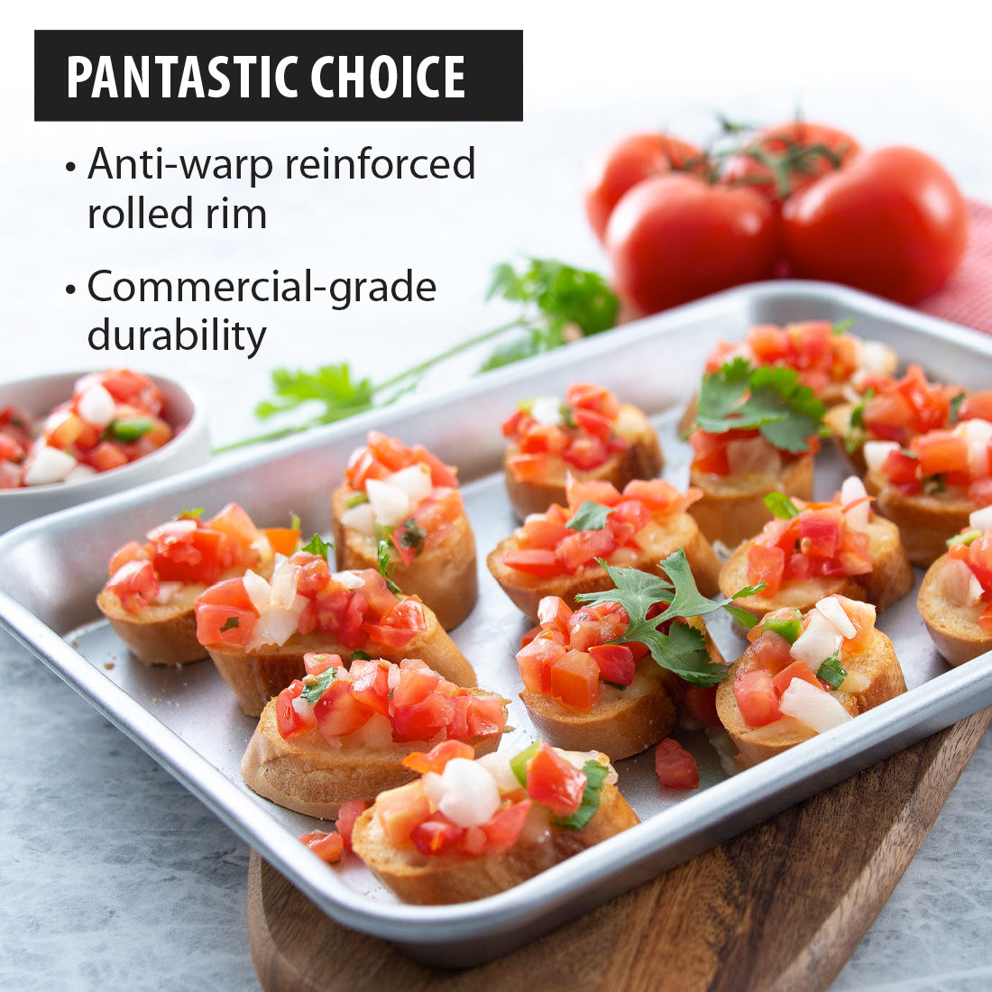 A promotional graphic of Rada Cutlery's Quarter Sheet Pan highlighting its anti-warp rolled rim and commercial-grade durability. The pan has bruschetta with tomatoes and herbs, sitting on a wooden board.