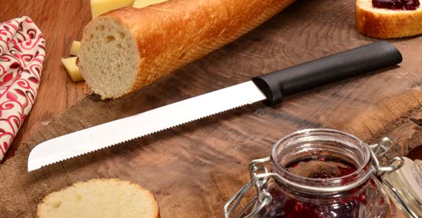 https://products.radacutlery.com/cdn/shop/products/bread-knife-serrated-blade-slice_1200x.jpg?v=1651249024