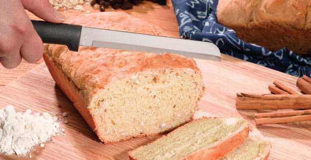 https://products.radacutlery.com/cdn/shop/products/bread-knife-slices-homemade-bread_1200x.jpg?v=1687977403