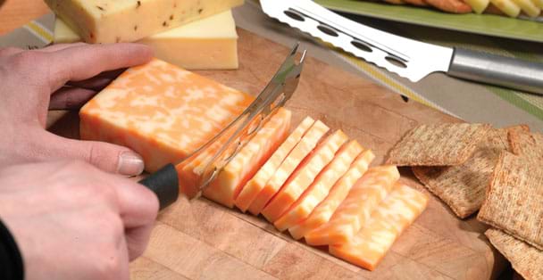 https://products.radacutlery.com/cdn/shop/products/cheese-knife-colby-jack_1200x.jpg?v=1687977179