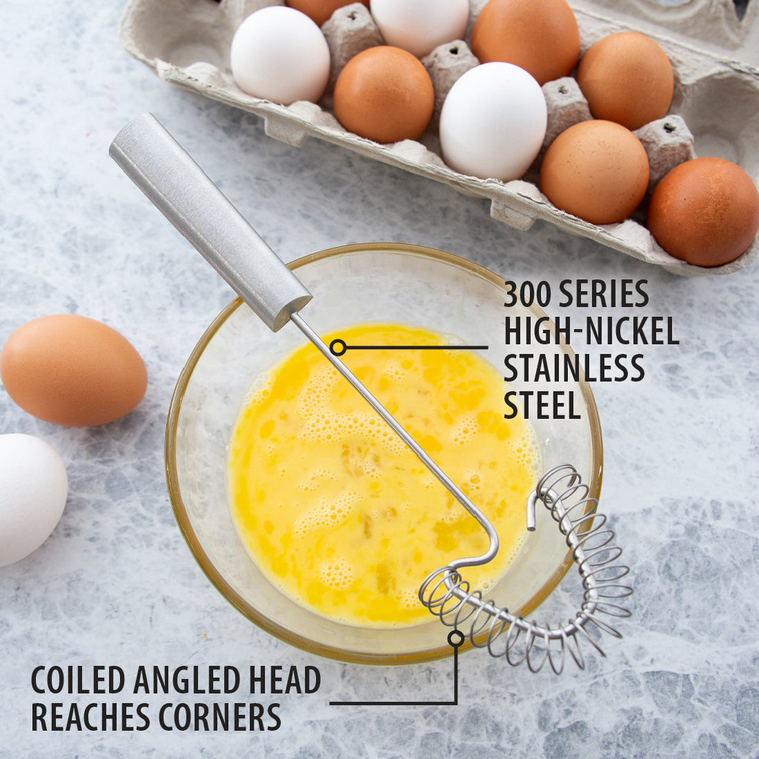 Handi-Stir on a bowl of whisked eggs. 300 series high-nickel stainless steel