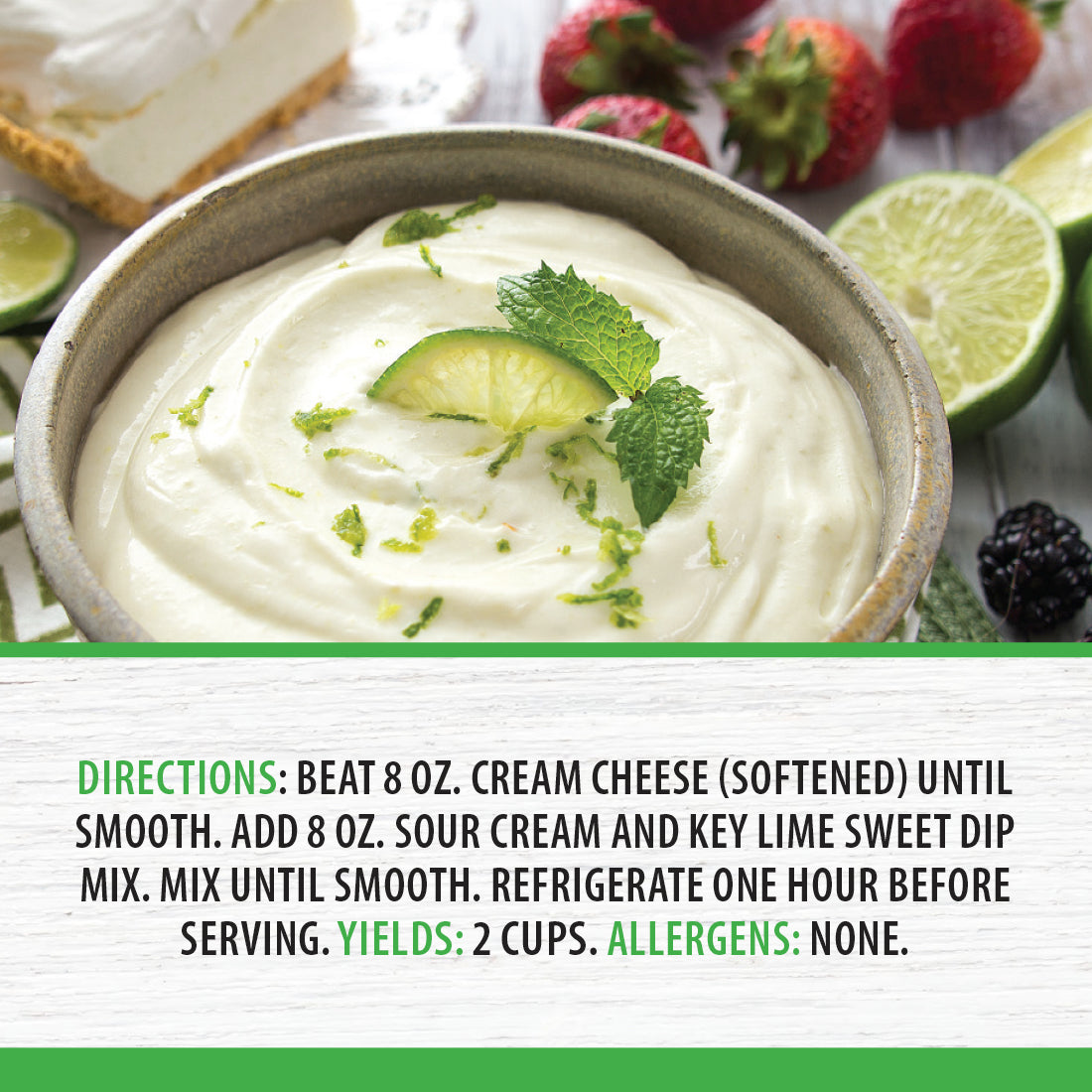 Key Lime Sweet Dip next to strawberries, graham crackers, limes, and a slice of key lime pie
