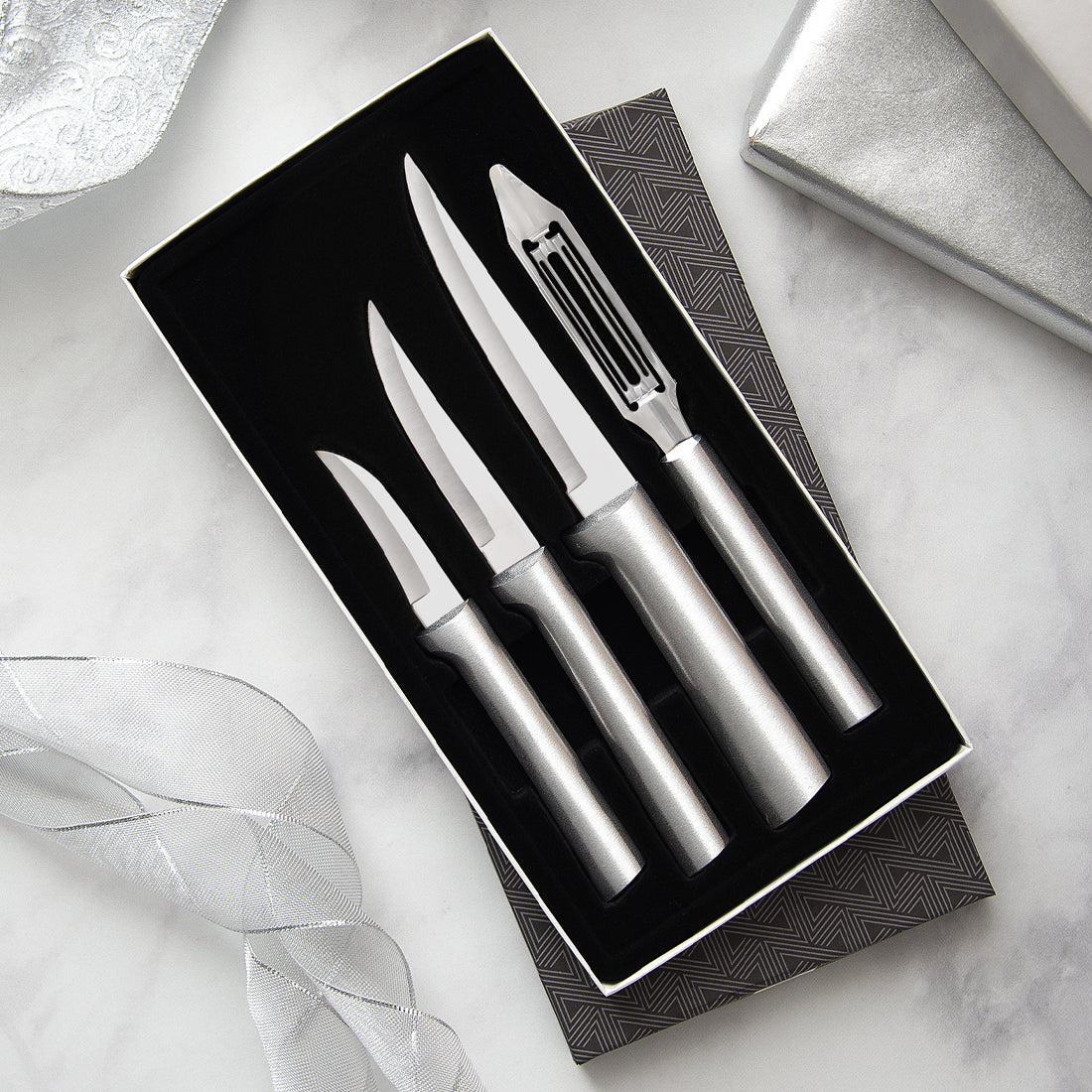 The Meal Prep Gift Set on a marble counter with silver table decor