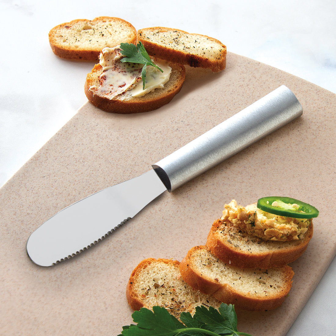 A Party Spreader on a cutting board with slices of bread