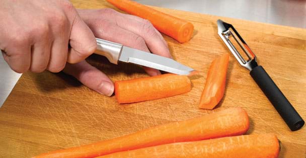 https://products.radacutlery.com/cdn/shop/products/serrated-paring-knife-with-carrot_1200x.jpg?v=1687977714