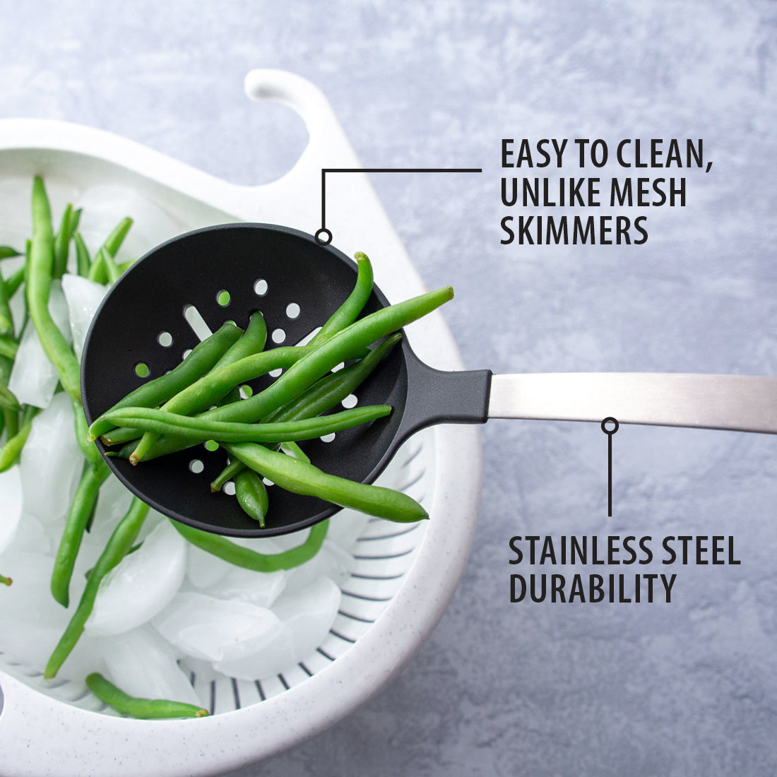 Rada Cutlery non-scratch Skimmer over a colander, straining green beans.