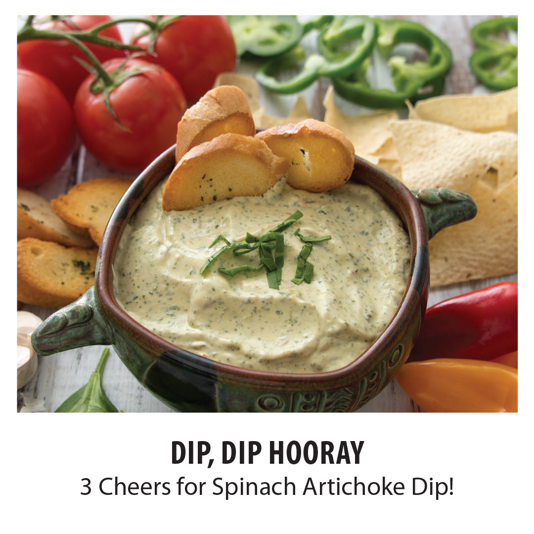 Dip, dip, hooray. 3 cheers for Spinach Artichoke Dip! Bowl of Spinach Artichoke Dip with baguette slices.