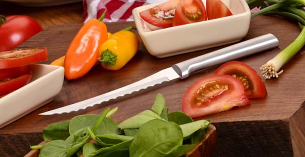 https://products.radacutlery.com/cdn/shop/products/tomato-knife-serrated-cut-vegetables_1200x.jpg?v=1651247067